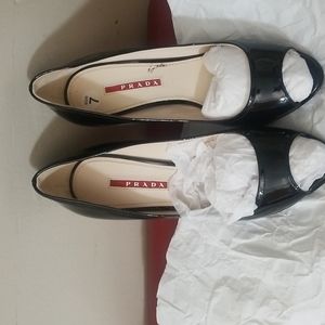 Brand New Prada Wedges. Comes with box.